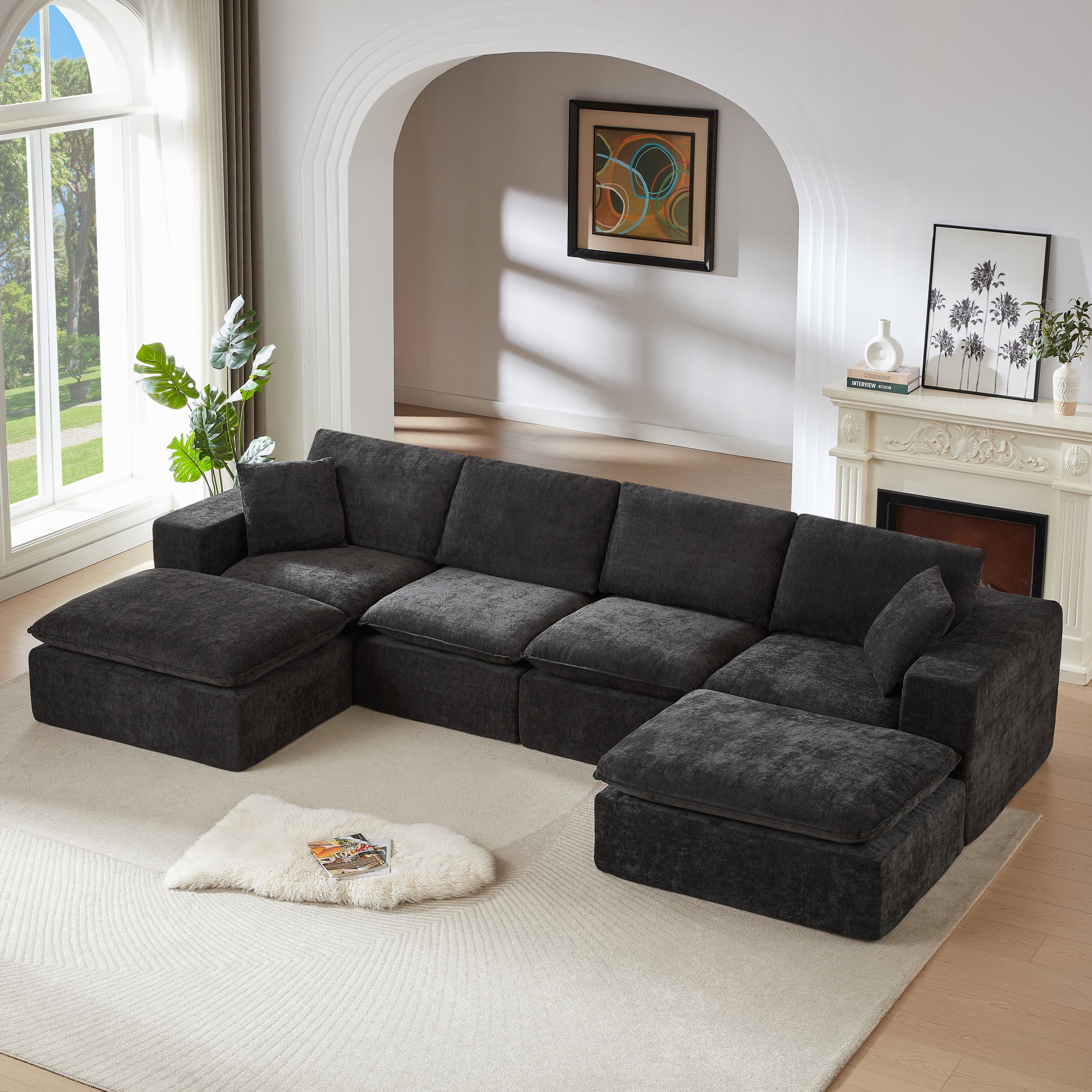 Chenille Cloud Sofa - Modern Comfort with a cozy throw rug and books, emphasizing its inviting and functional design for home use.