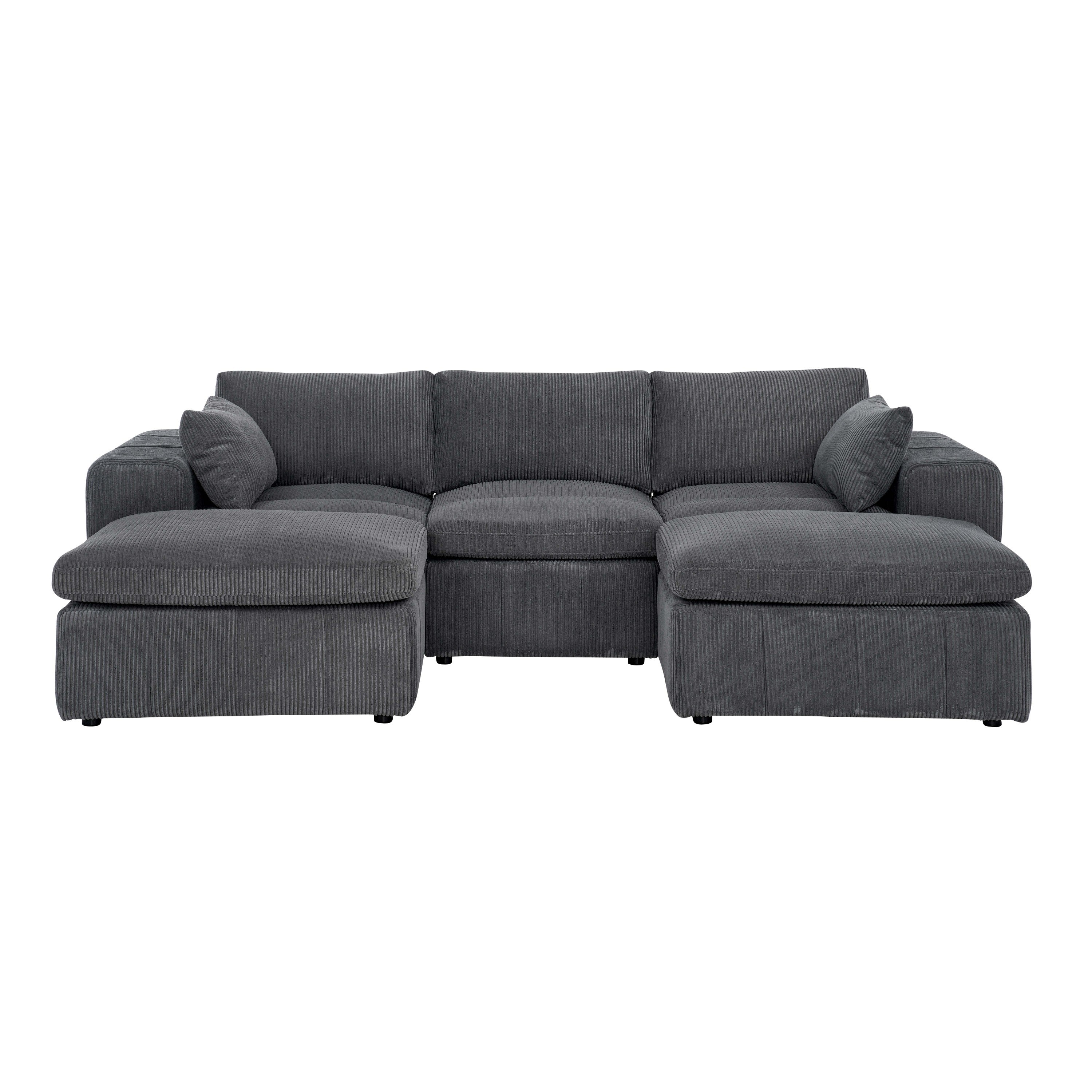 Front view of large corduroy modular sectional with two ottomans and plush cushions. Ideal for spacious living areas and flexible seating.