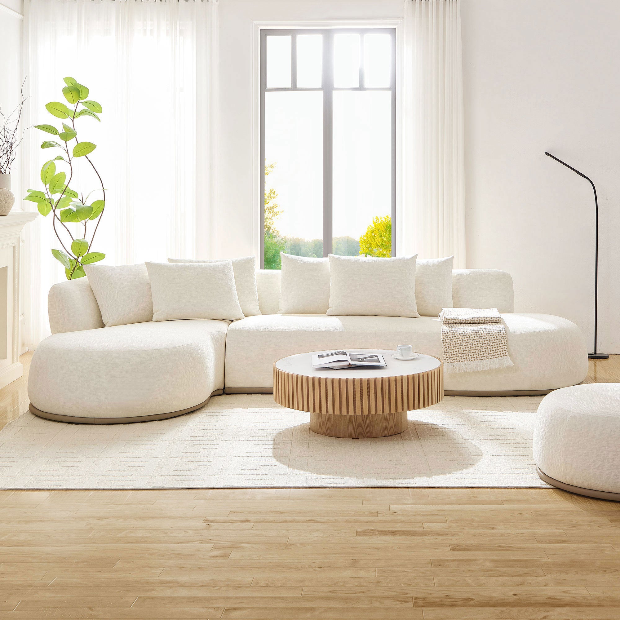 L-Shape Sectional Sofa Beige with Chaise in sunlit room, styled with minimalist decor and soft area rug for cozy ambiance.