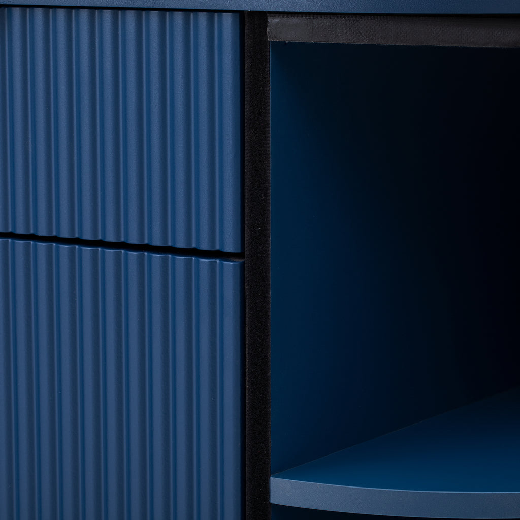 Detail view of the Modern Storage Cabinet showing ribbed curved doors and open shelving, crafted from MDF in a sleek navy blue finish.
