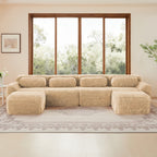 Spacious U-shaped modular sofa with plush fabric and ergonomic backrests, perfect for cozy and stylish living room setups.