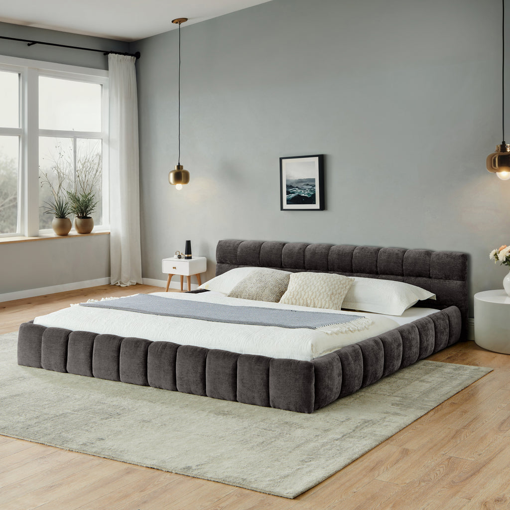 Dark gray chenille California King platform bed with a channel-tufted, upholstered headboard and low-profile frame.