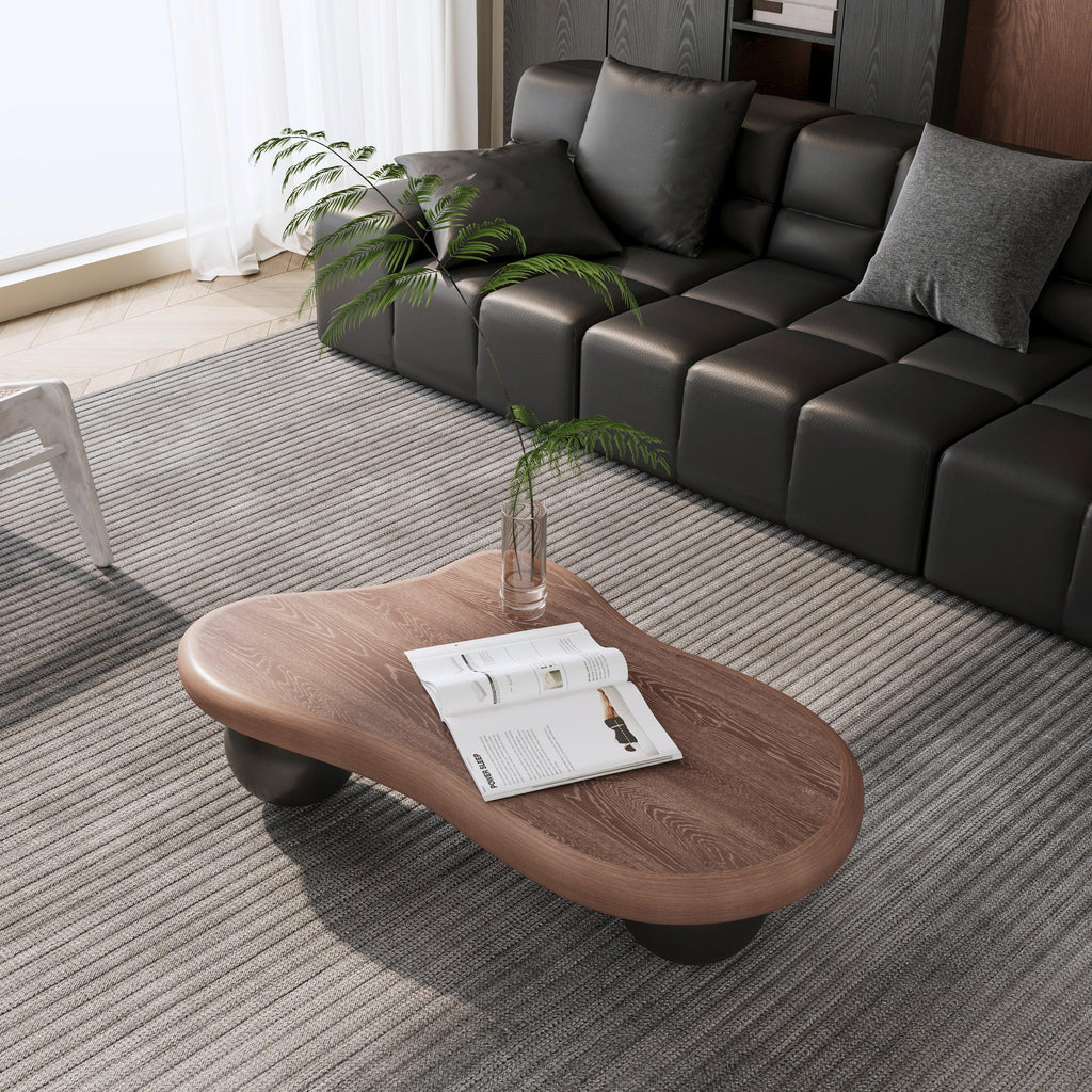 40 Inch Cloud Shaped Coffee Table - Walnut Top Black Legs.