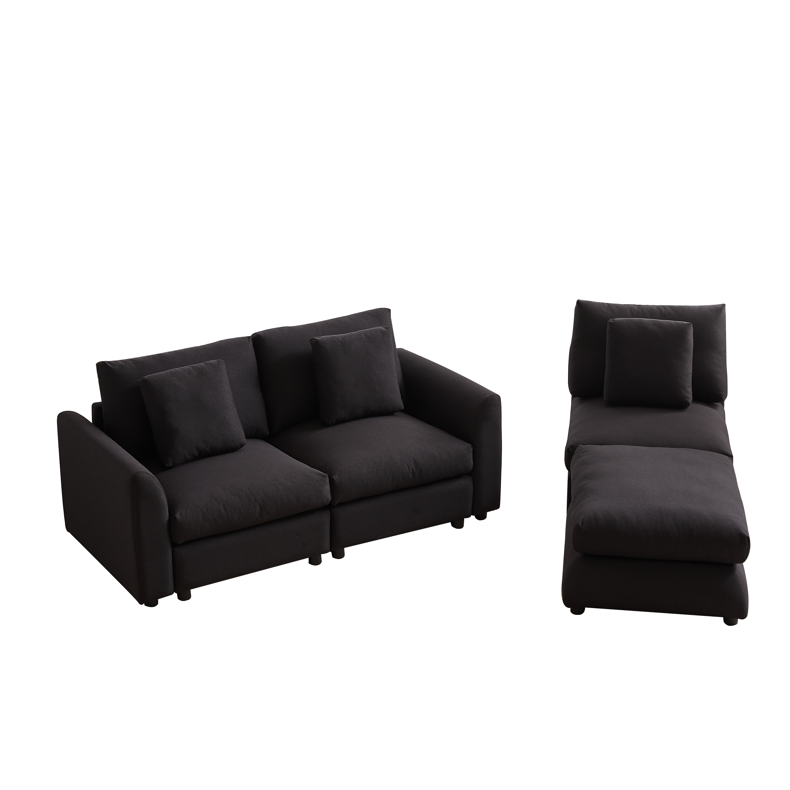 Modular sofa with ottoman in L-shaped layout, featuring 3 seat cushions and pillows in dark fabric, ideal for modern living rooms or apartments.