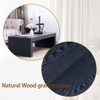 Natural wood grain texture of the 47.6 modern black ribbed coffee table highlighted in a close-up, enhancing its organic appeal.