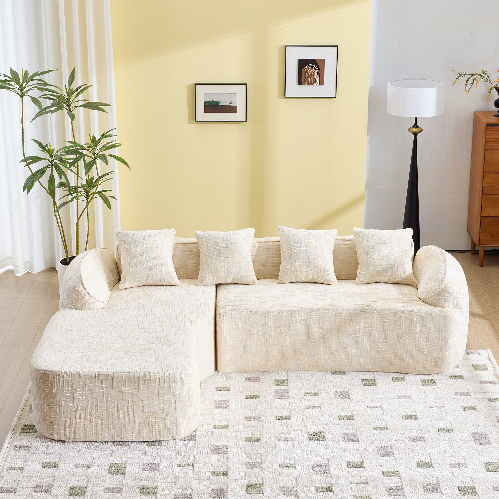 Beige chenille L-shaped sofa with plush cushions and wide seating, perfect for cozy and stylish living spaces.
