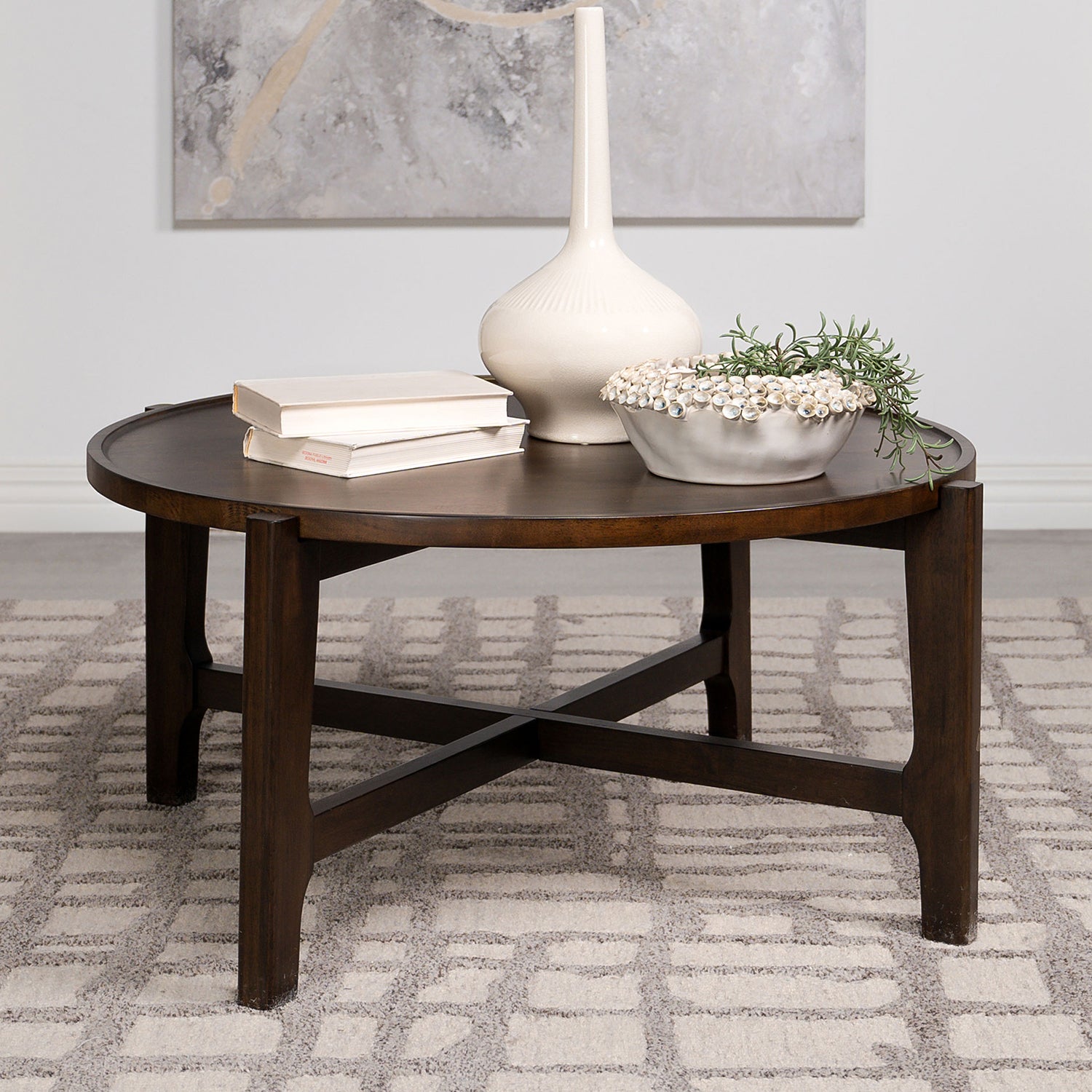 Perfect Coffee Table styled in a living room with books and decor, showcasing its dark brown solid wood finish and sturdy build.