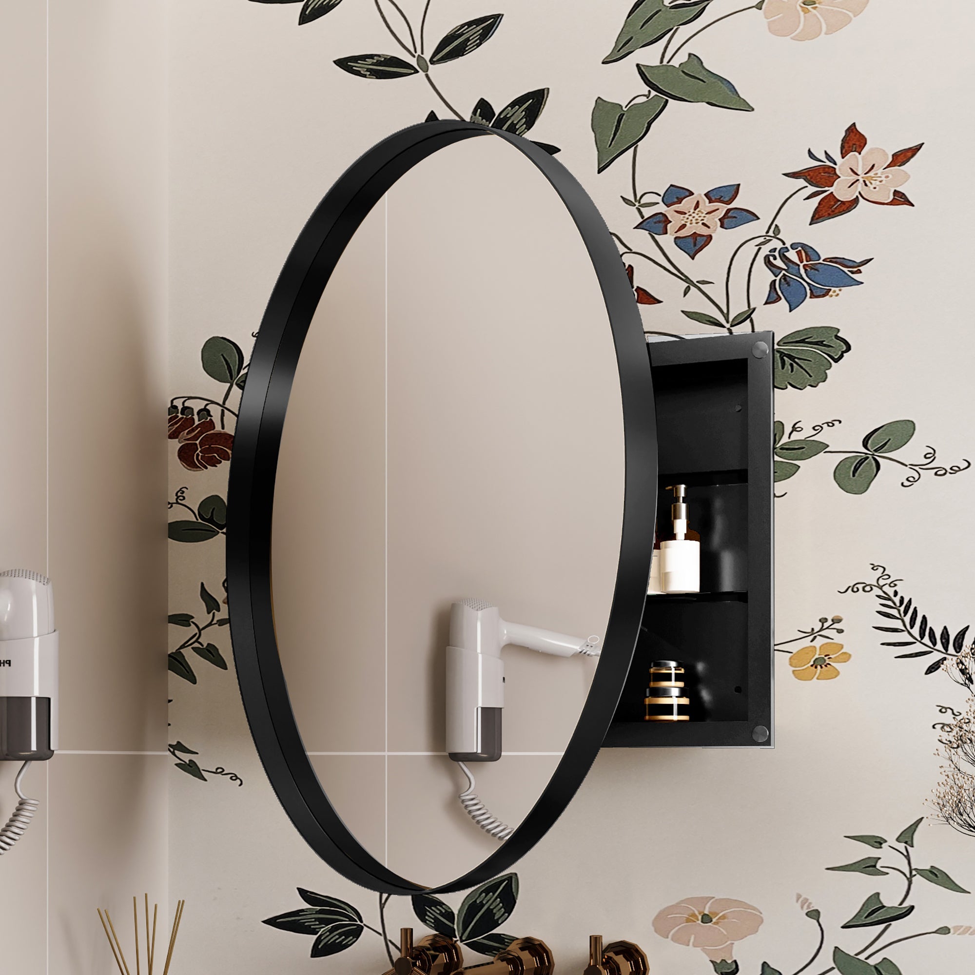 Round Black Metal Medicine Cabinet with Mirror mounted on floral bathroom wall, featuring side storage shelves for toiletries.