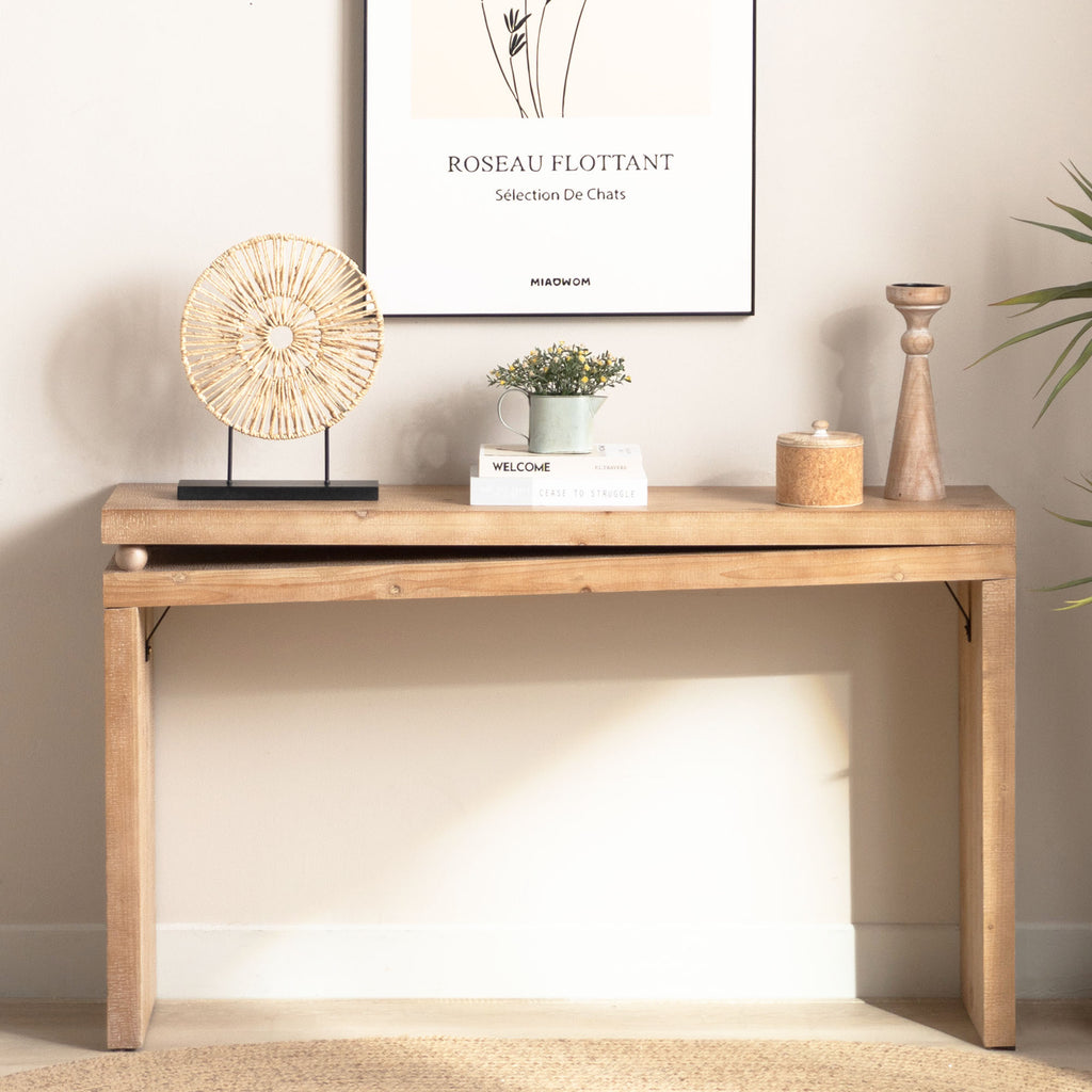 Narrow entryway table styled with decor, showcasing the Slim Natural Wood Console Table's bead detail and compact design for small spaces.