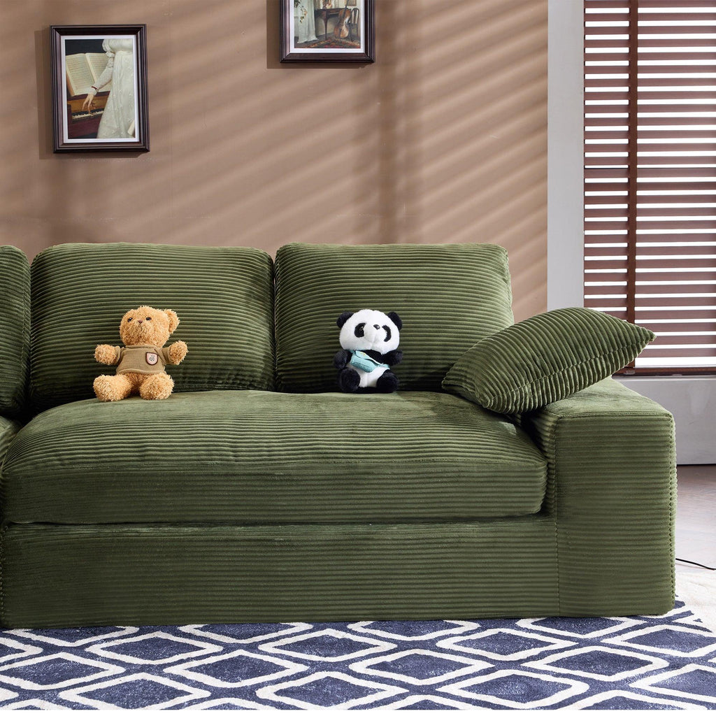 Green Corduroy Sofa with Cushions and Pillows.