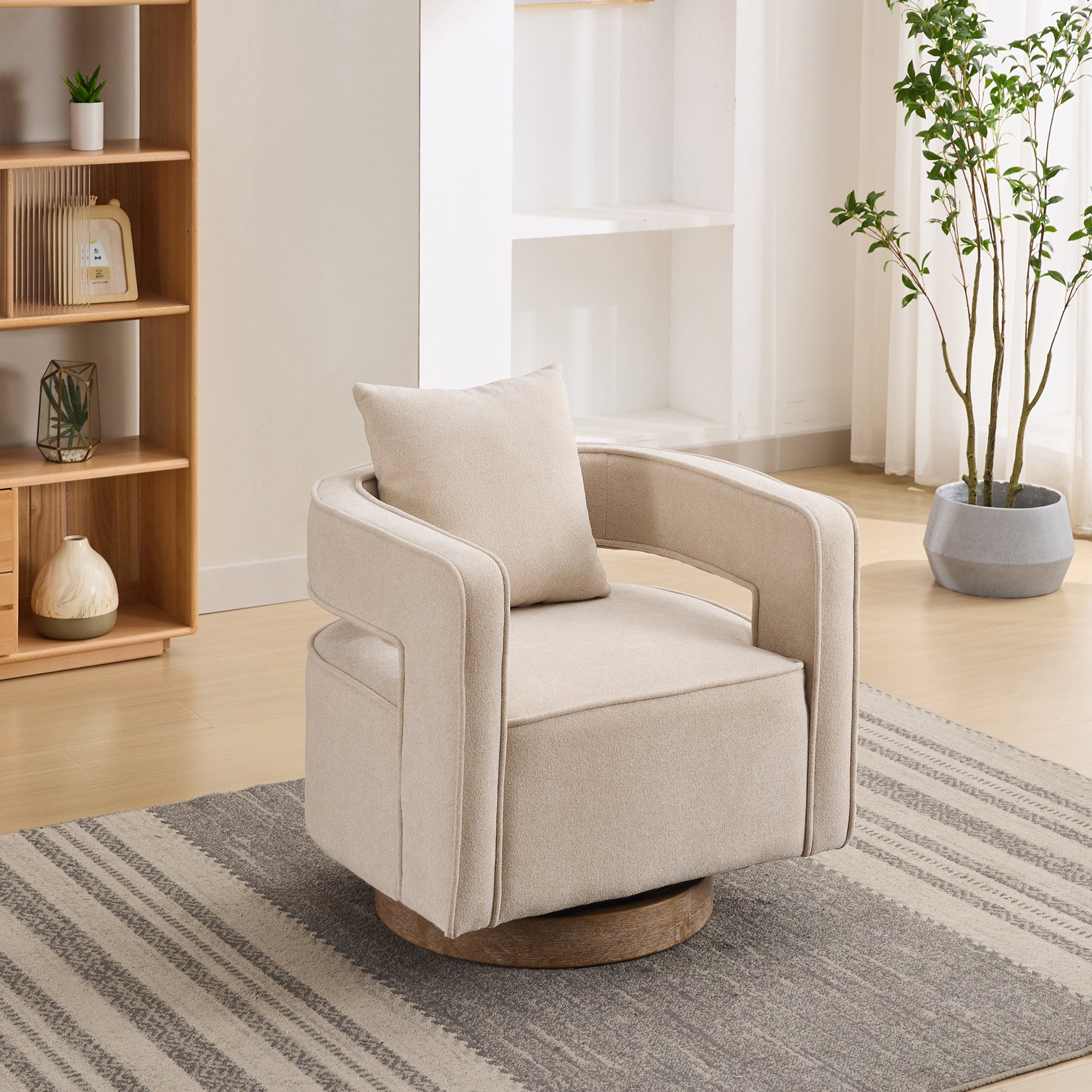 Angled view of linen swivel accent chair with open back and weathered wood base, offering stylish comfort and full rotation.