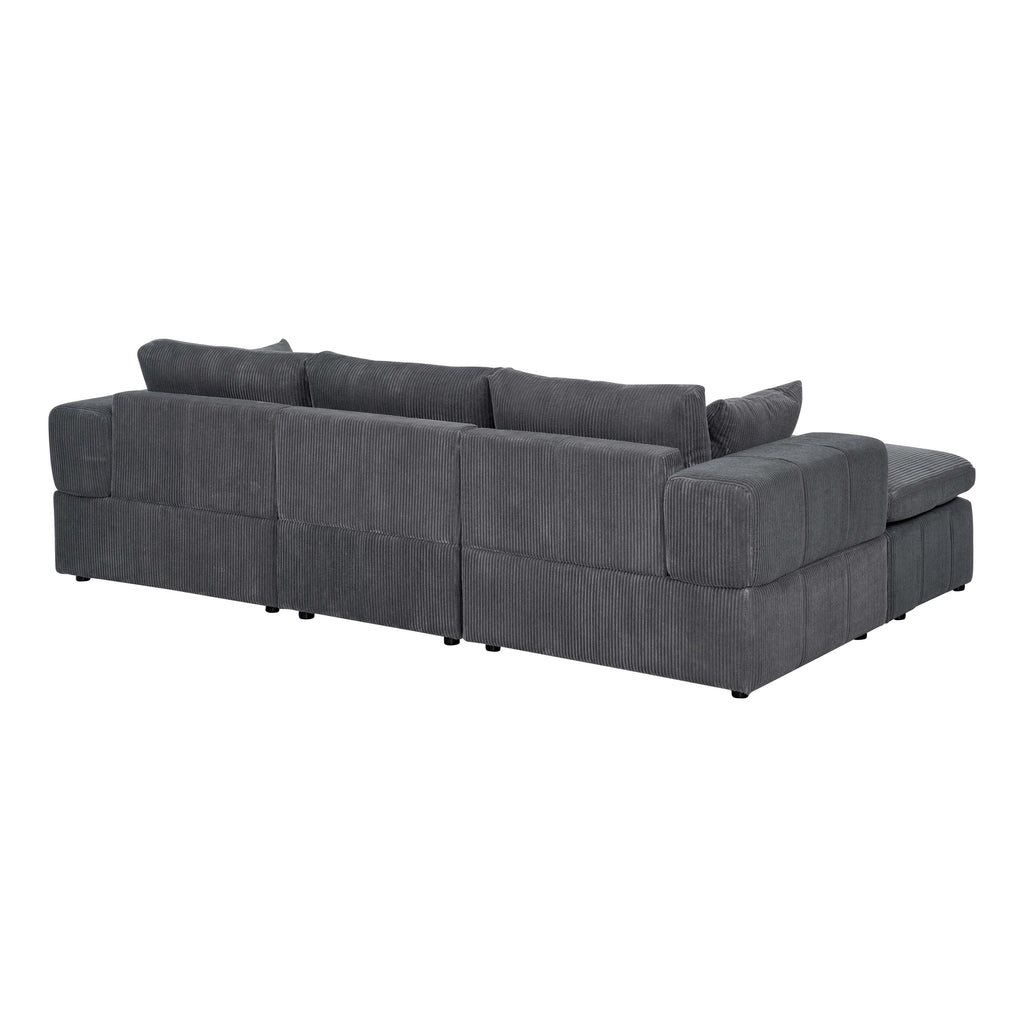 Rear view of large modular sectional in dark gray corduroy. Displays clean lines and modular back panel construction.