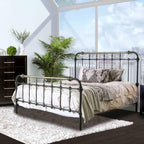 Antique Black Queen Size Bed with Gold Accents.