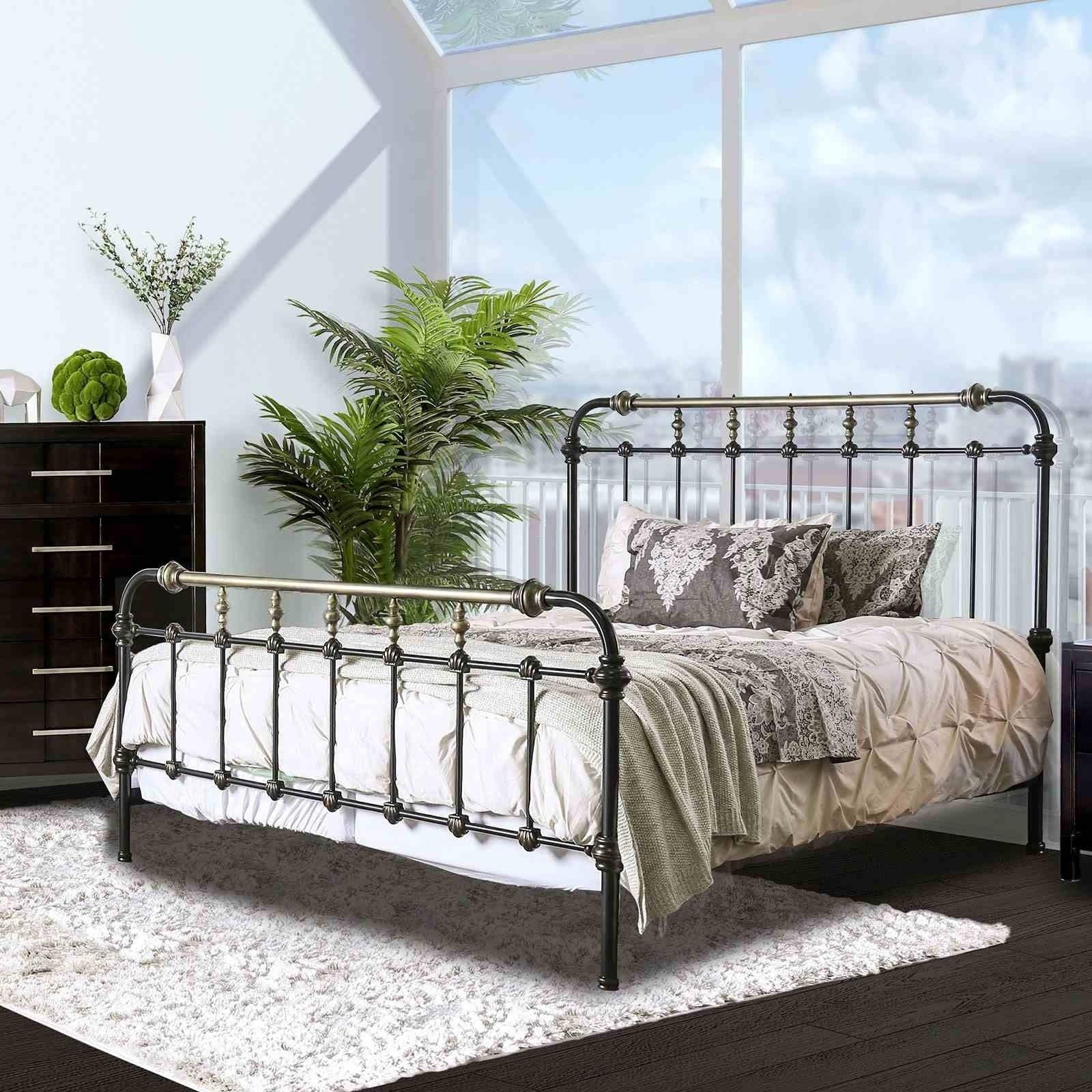 Antique Black King Size Bed with Gold Accents.
