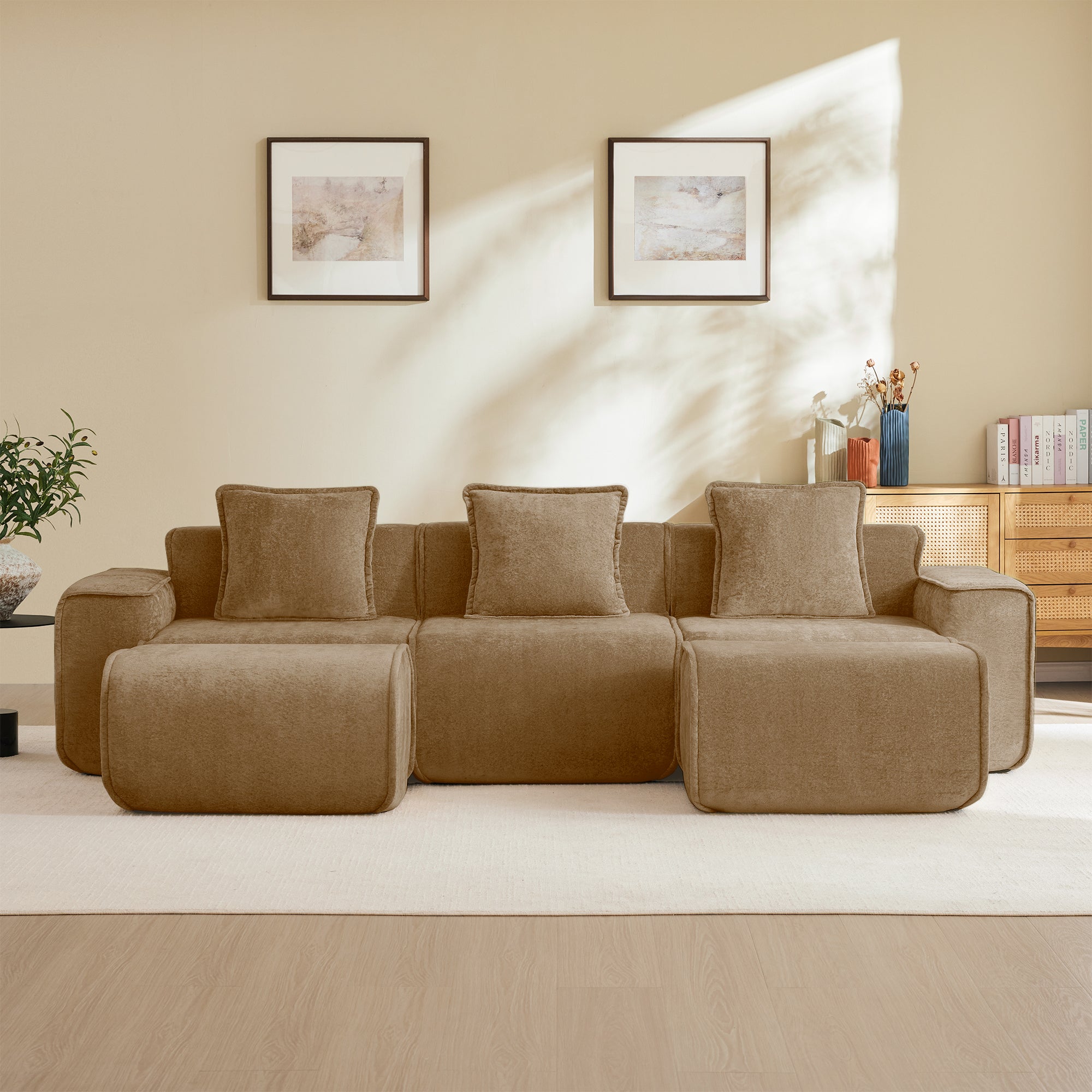 Front view of Modular Velvet Brown 3 Seat Sectional Sofa with Ottomans, showcasing plush cushions and sleek modular design on a neutral rug.