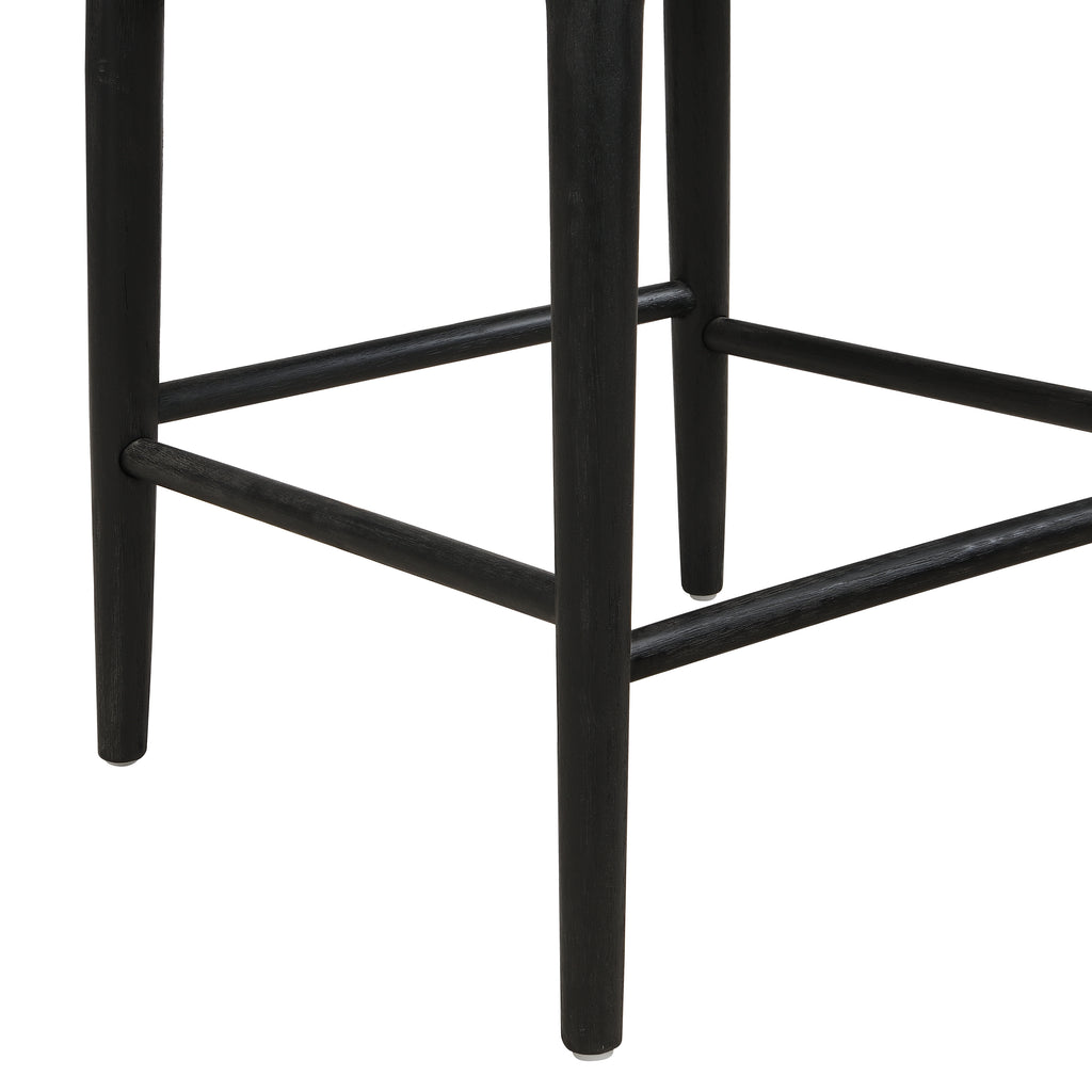 Close-up of Black Fabric Counter Stool legs and footrest, built with sturdy rubberwood for long-lasting support.