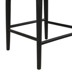 Close-up of Black Fabric Counter Stool legs and footrest, built with sturdy rubberwood for long-lasting support.