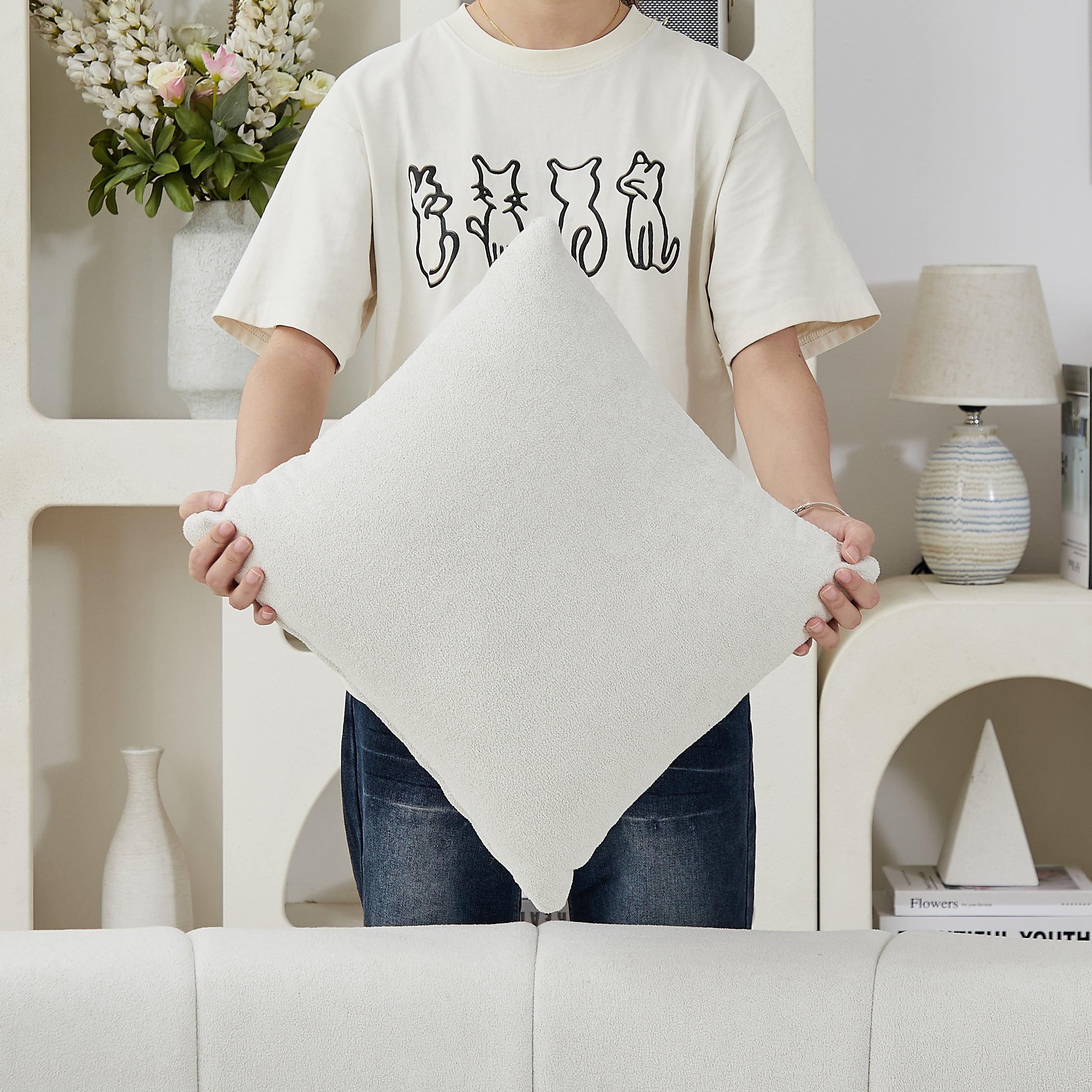 Curved Sectional Sofa with 4 Pillows for Stylish Seating.