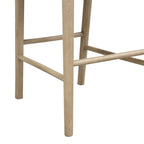 Close-up of wooden legs and footrest bars, showing durable construction and natural wood grain of the bar stool.