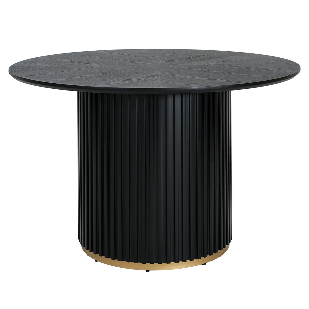 Modern black pedestal dining table with circular top and gold-accented base. Perfect for seating 4 in elegant dining areas.