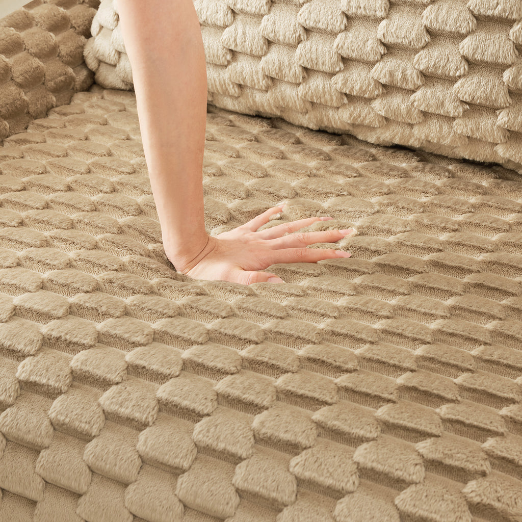 Hand pressing into the cushion of Modern U-Shaped Modular Sofa, demonstrating its soft, high-resilience foam and flannelette comfort.