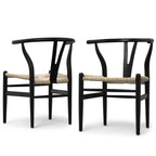 Set of 2 matte black beech wood dining chairs with ergonomic Y-back and woven seats, perfect for contemporary interiors.