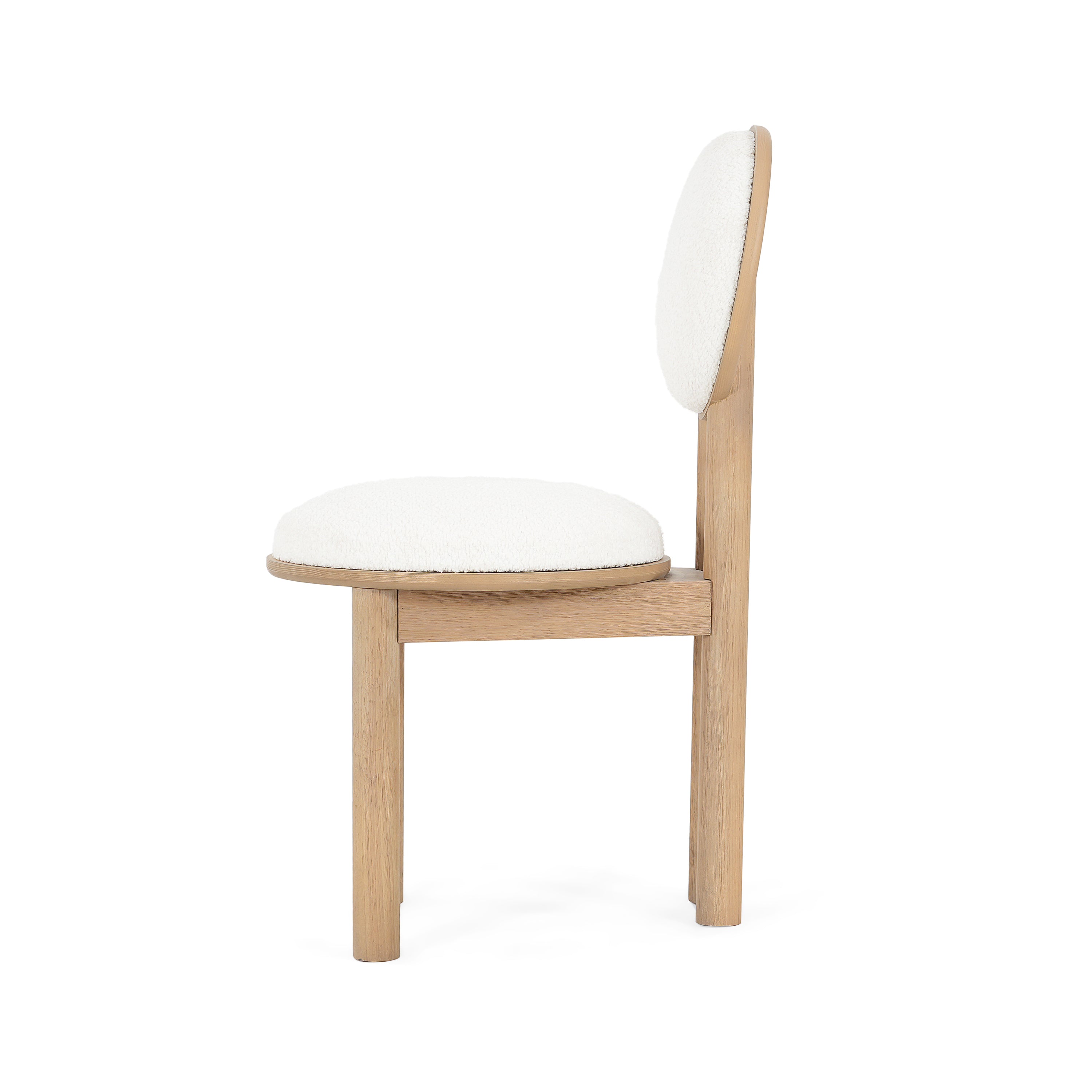 Side profile of polyester dining chair showing thick cushioned seat and circular backrest.