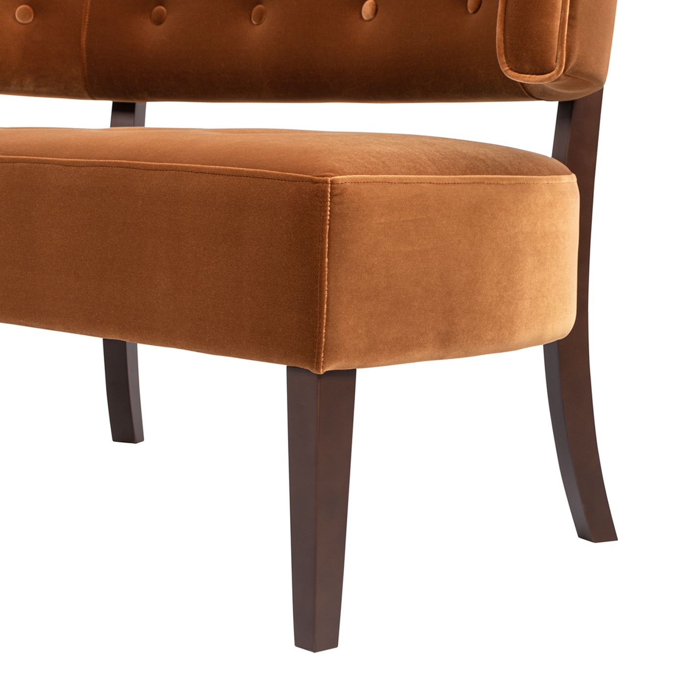 Close-up of Burnt Orange Velvet Bench leg and upholstery, showcasing durable hardwood construction and plush velvet fabric.