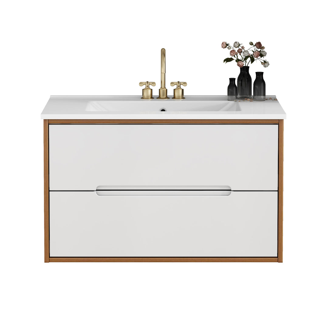 Straight-on product shot of 32-inch bathroom vanity with ceramic sink, handle-free drawers, and walnut and white finish.