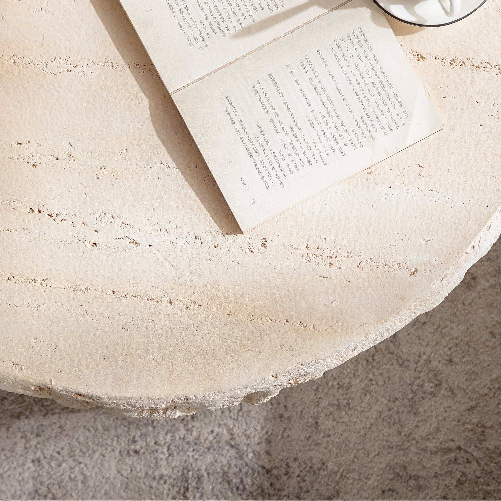 Detailed view of the Mid-Century MgO Coffee Table top surface, showcasing its realistic stone texture and smooth finish.