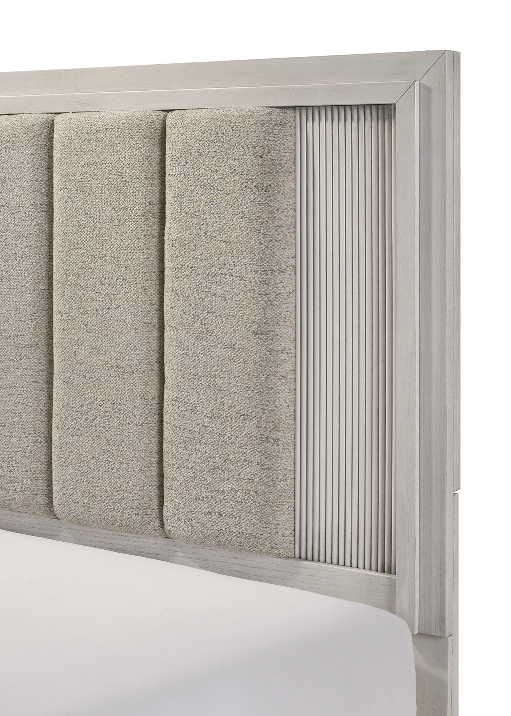 Close-up of King Size White Bed Frame headboard featuring vertical upholstered panels and textured wood detailing.
