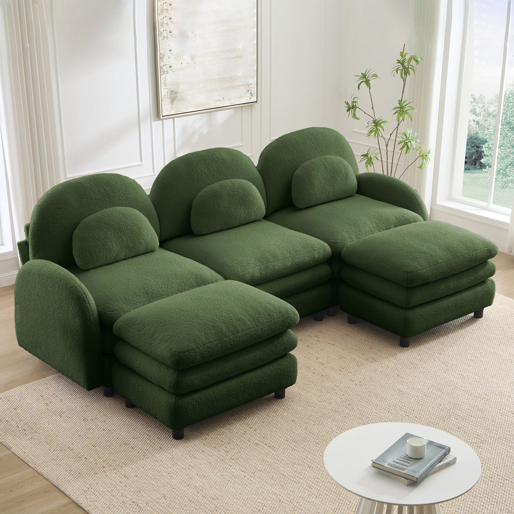 Green teddy fabric 3-seater sectional sofa with a curved back, lumbar pillows, and two movable matching ottomans.
