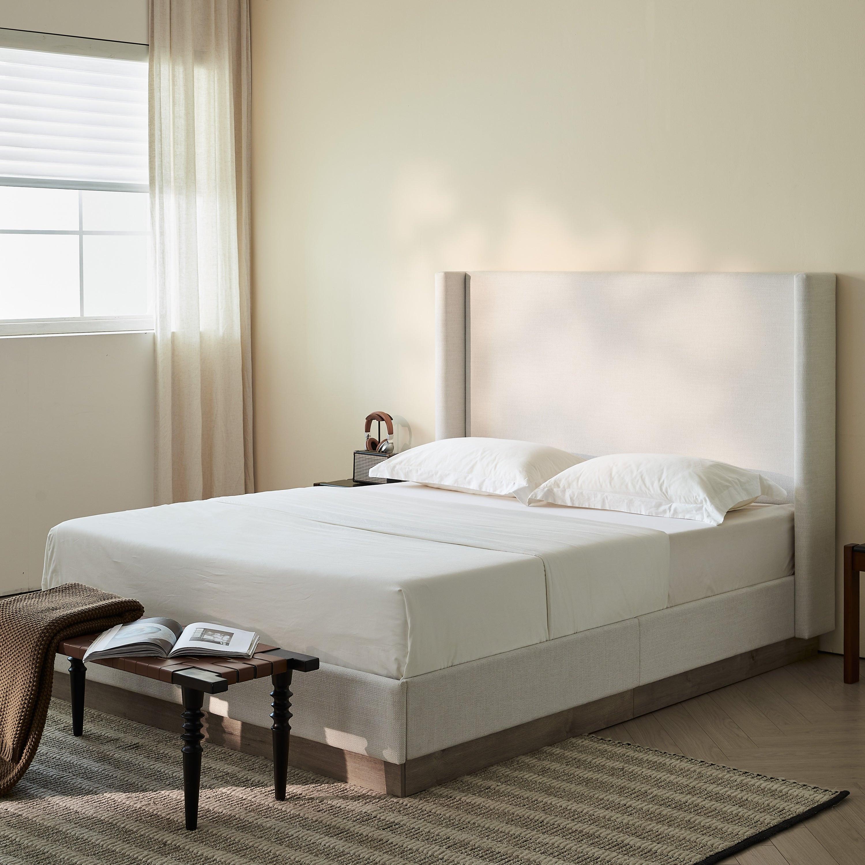 Hosford Minimalist Upholstered Wingback Bed.
