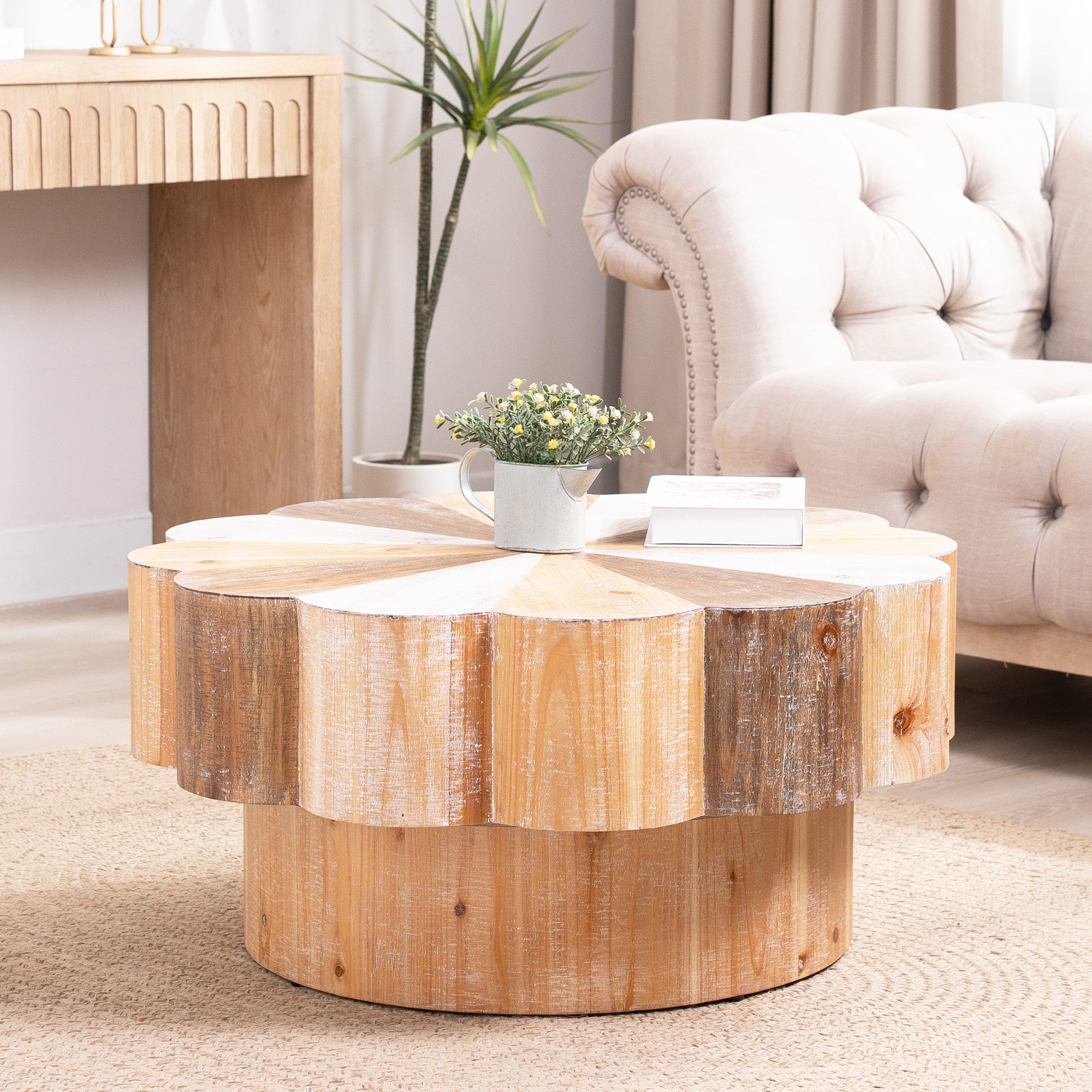 Rustic flower-shaped coffee table placed in a cozy living room setting, complementing neutral-toned furniture and decor.