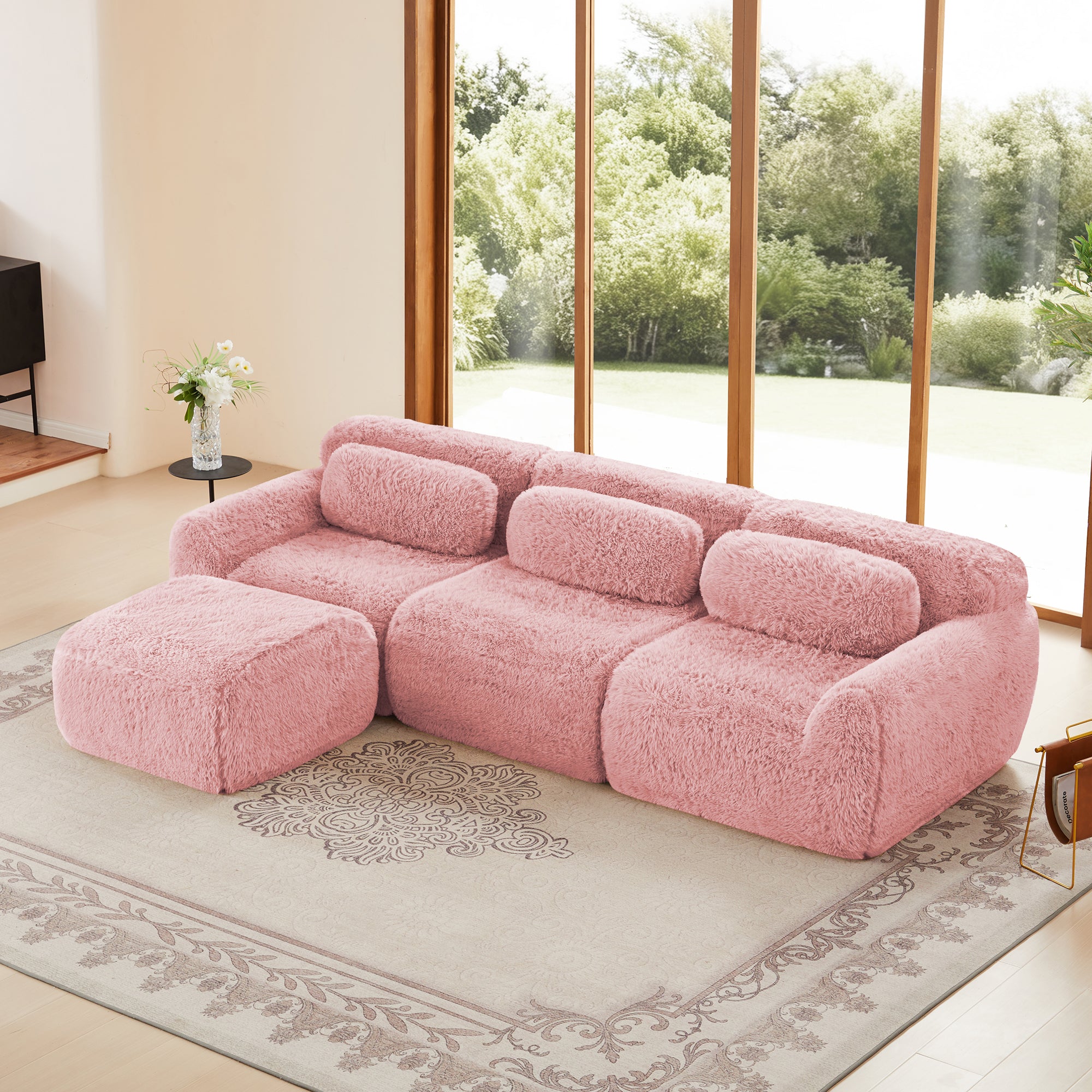 Plush modular sofa in pink with movable ottoman, no assembly needed. Features ergonomic design and anti-slip base for modern living rooms.