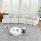 Curved Sectional Sofa with 4 Pillows for Stylish Seating.