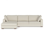 Cream performance fabric left-facing sectional sofa with a solid wood frame and plush high-density foam cushions.