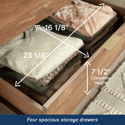 Interior view of brown dresser drawer showing spacious storage dimensions ideal for folded clothes and accessories.