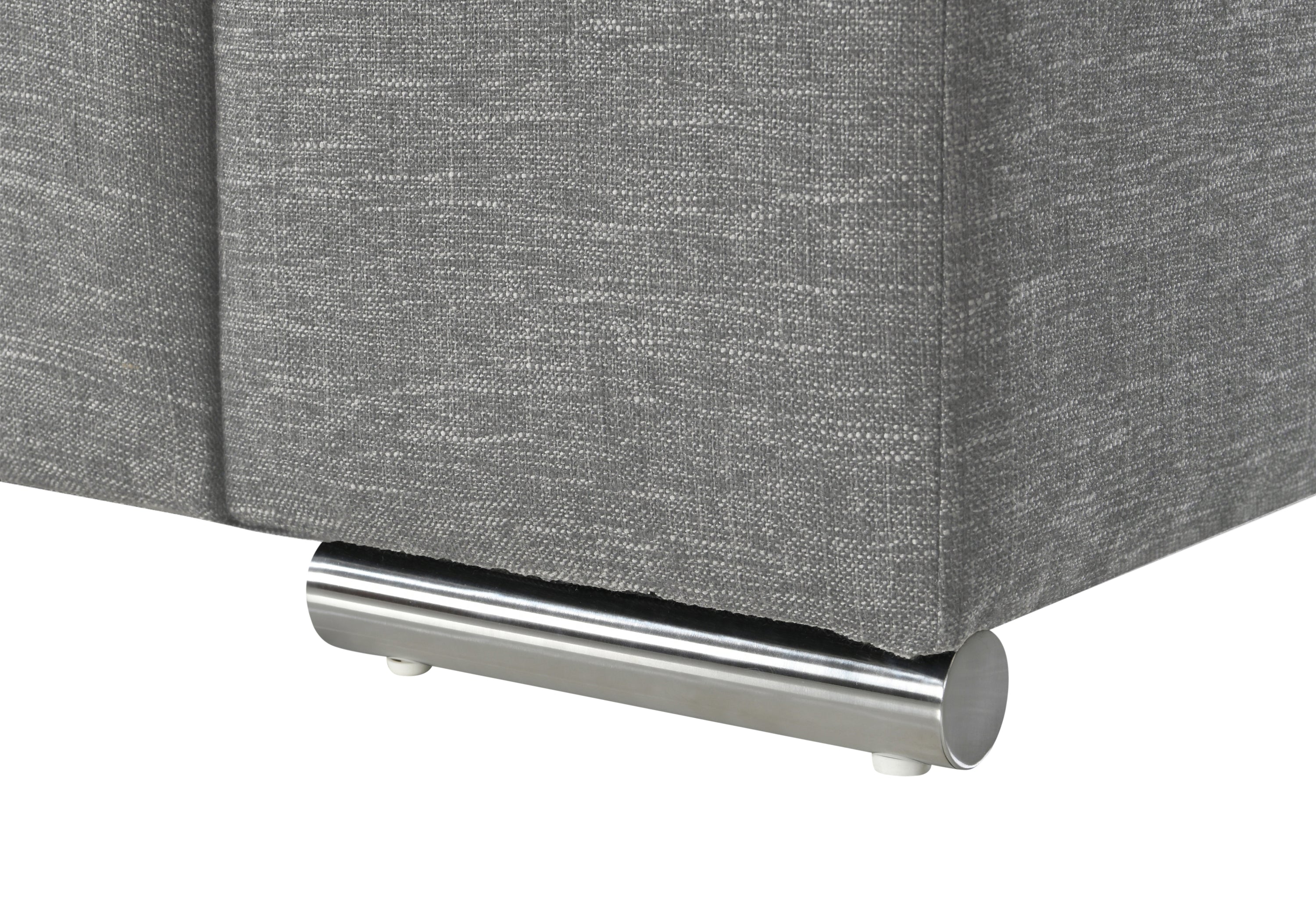 Detail of chrome leg on gray woven fabric arm chair, highlighting the sturdy base and contemporary finish for living room decor.