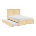 Contemporary full-size natural pine platform bed with a pull-out twin trundle and minimalist wooden headboard.