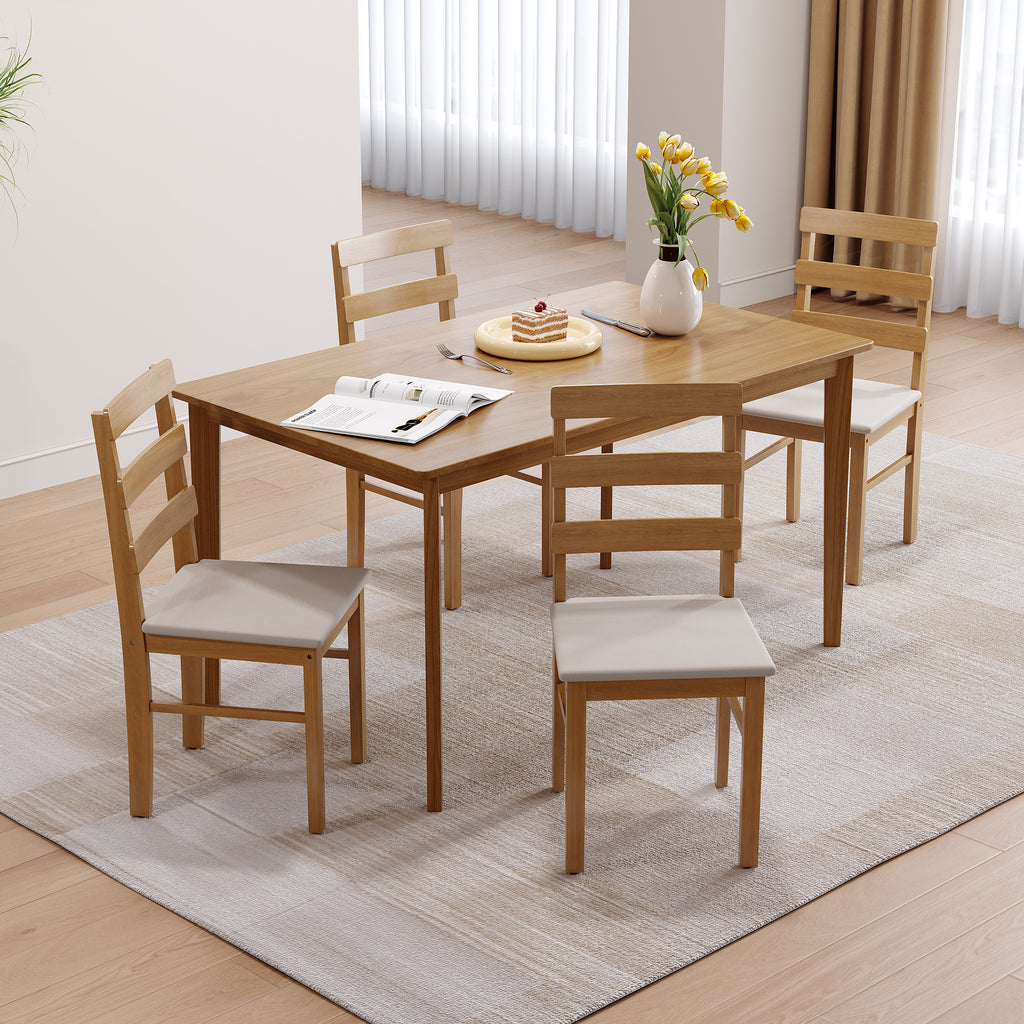 Angled view of solid wood dining table set with 4 chairs. Showcases spacious tabletop and cushioned seating for comfort.