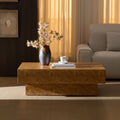 43.31-inch faux burl wood coffee table with rectangular mid-century modern design and sturdy MDF pedestal, styled in a cozy living room setting.