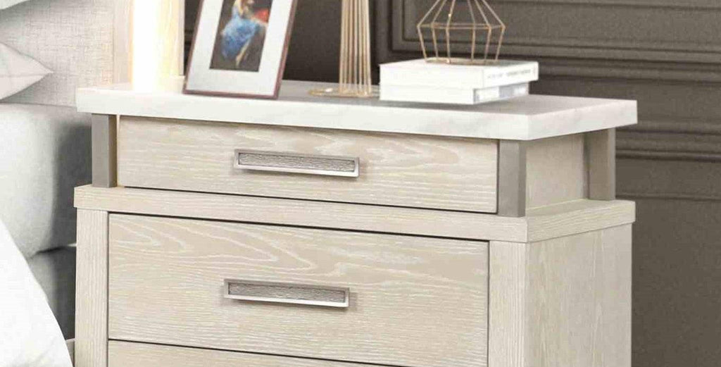 Transitional Nightstand with Marble Top and Metal Handles.