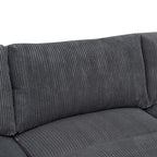 Close-up of corduroy back cushion on modular sectional. Shows plush texture and durable upholstery fabric.