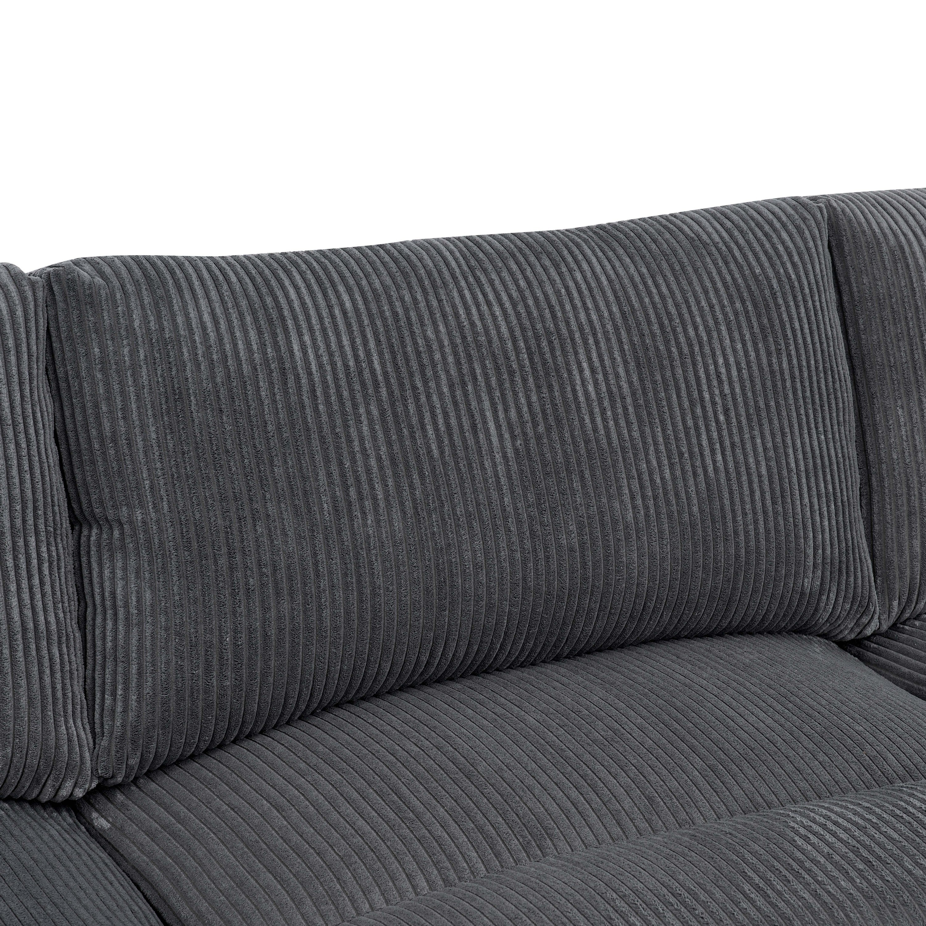 Close-up of corduroy back cushion on modular sectional. Shows plush texture and durable upholstery fabric.