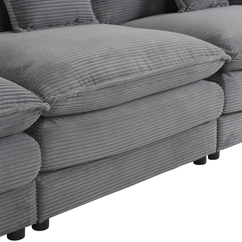 Close-up of seat cushions on modular sofa, emphasizing the thick padding and ribbed corduroy fabric for comfort and durability.