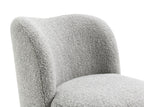 Detail of the curved backrest and soft boucle fabric on the gray accent chair, highlighting its modern and cozy design.