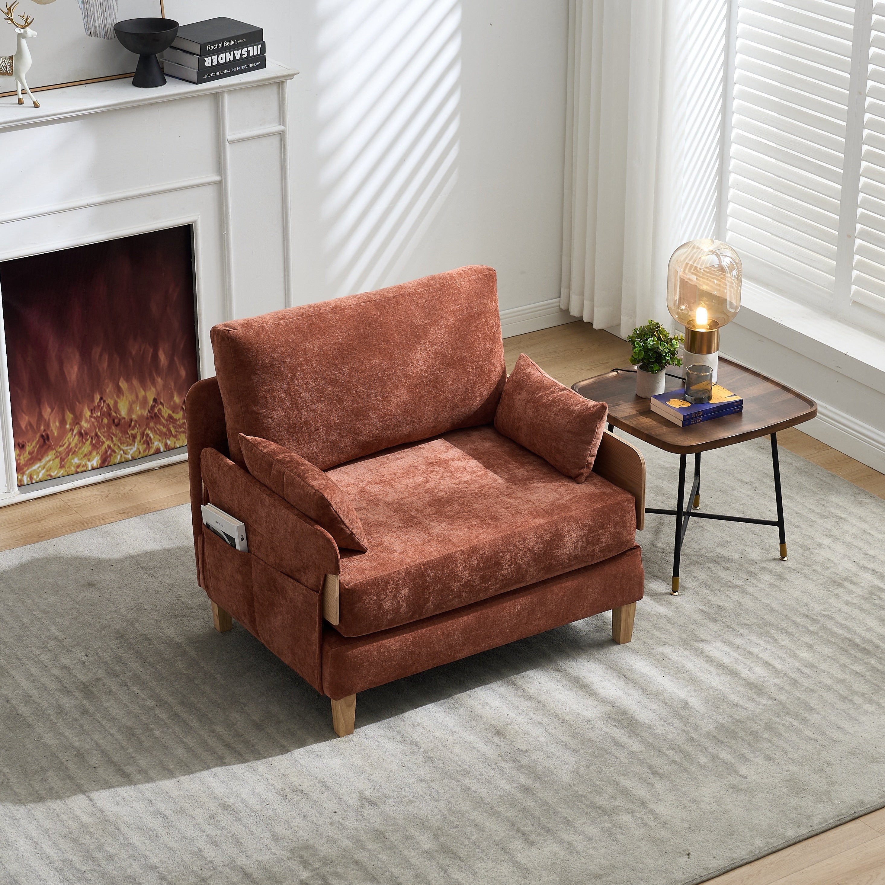 Compact Convertible Sofa Bed Recliner in orange chenille, styled as a chair with side pocket and pillows, perfect for modern living rooms.