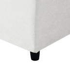 Detail of black leg on 130' Modular Sofa Bed - Convertible 6 Seat Sectional, showing sturdy base and textured white chenille upholstery.