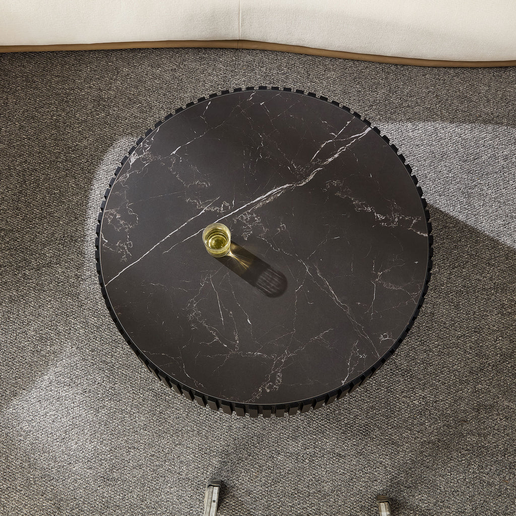 Overhead view of the 35.43'' modern round coffee table with black sintered stone top, placed on a textured gray carpet.